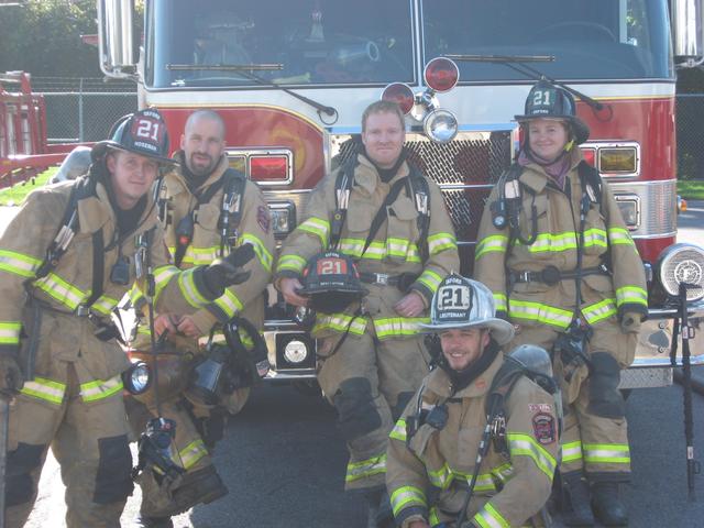 (L-R) Hoseman Bill Hensel, Captain Bob Prettyman, Safety Officer Terry Reisinger, Lieutenant Greg Paxson, and Firefighter Michelle Smith